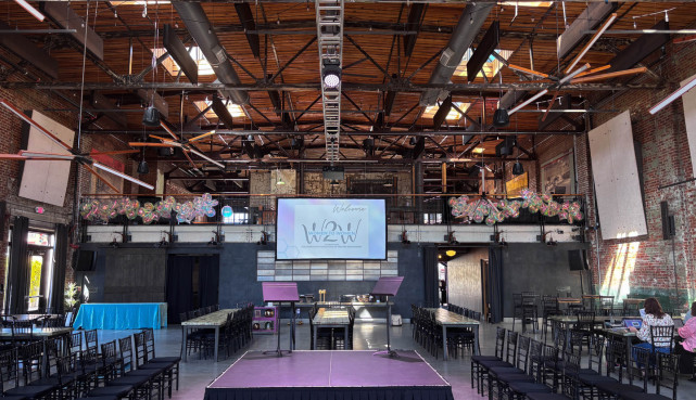 Video screens at the Next now event